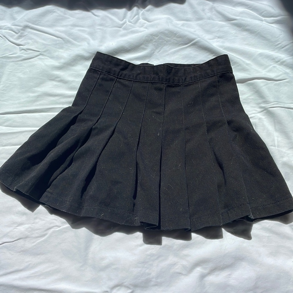 Pleated black cheerleader skirt